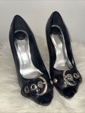 BCBGeneration Black Peep-Toe Heels with Silver Buckle Accents